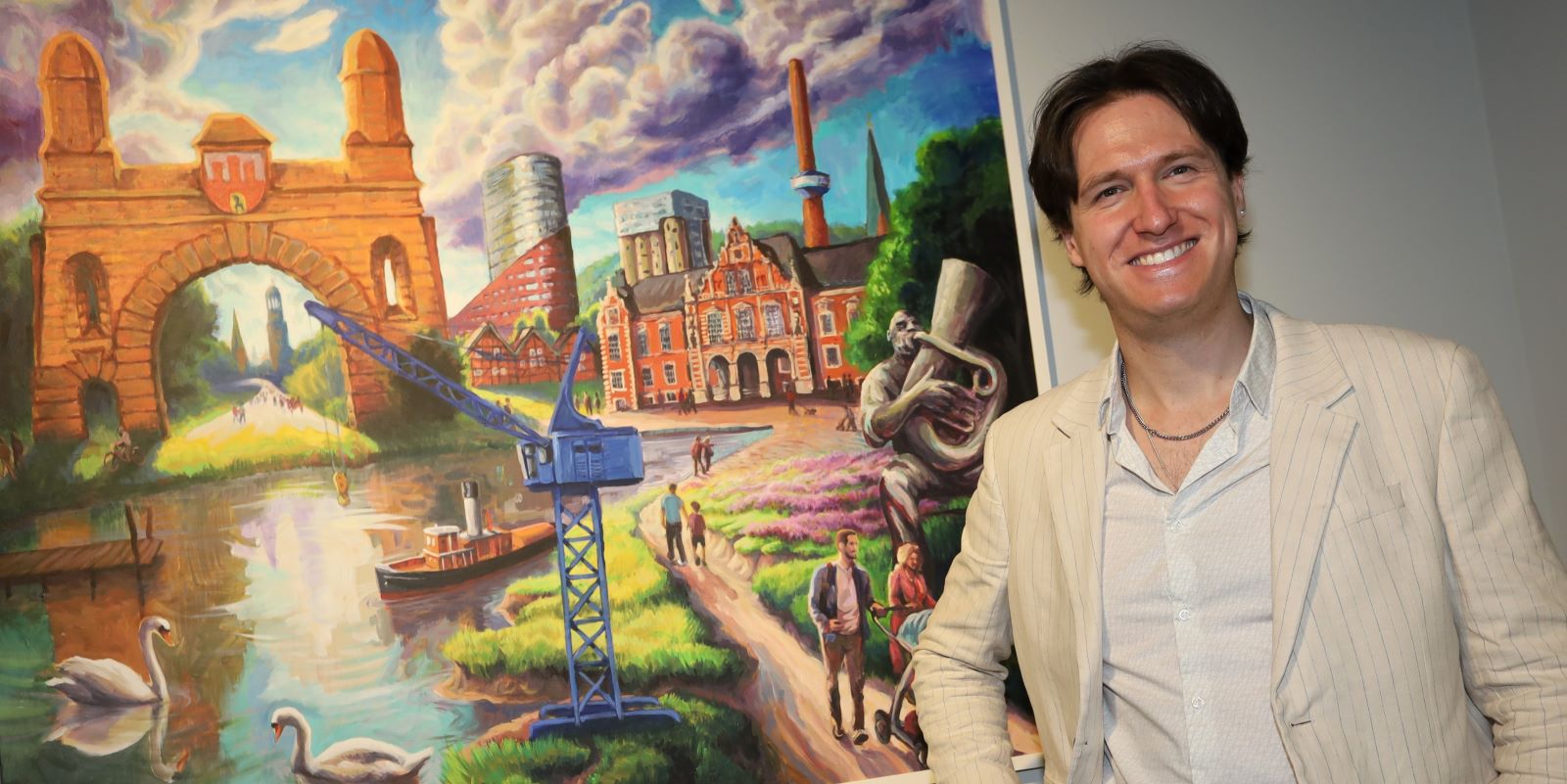 Ralf Schwinge vor einem seiner Gemälde. Foto: Christian Bittcher